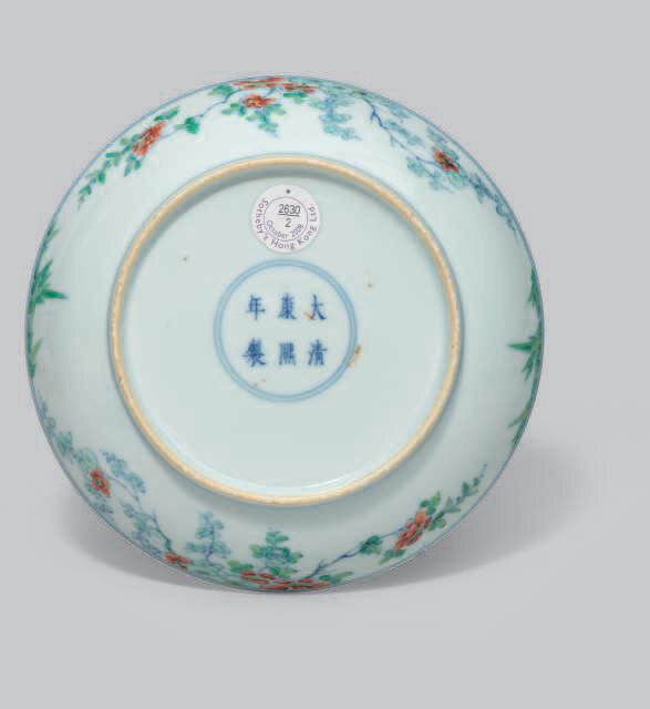 A doucai 'magpie and prunus' dish, Kangxi six-character mark in underglaze blue within a double circle and of the period (1662-1722)