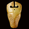 A small yellow jade animal head, late shang dynasty