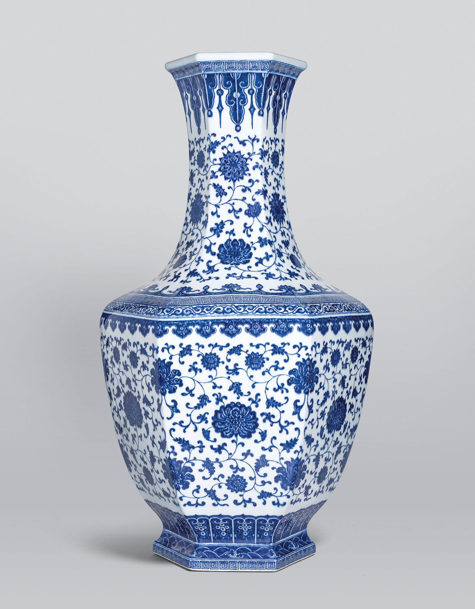 A rare large blue 'lotus scroll' hexagonal vase, Qianlong six-character seal mark and of the period - Alain.R.Truong