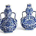 A pair of blue and white 'dragon' double-gourd vases, qianlong seal marks and period (1736-1795)