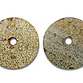 Two hardstone bi discs, northwest or southwest china, 2nd millennium bc