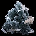 Stilbite, chalcedony, calcite, hematite, youngite, adularia, apophyllite, stellerite & basalt 