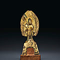 A small gilt-bronze figure of avalokiteshvara, northern wei dynasty, dated ad 491