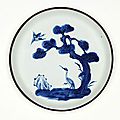 Bleu de Hue dish decorated with cranes and pine trees, Qing dynasty (1644–1911), Export ware for Viet Nam, circa 19th century-20th century, porcelain with underglaze decoration and metal rim, 1.9 x 16.4 cm. Gift of Dr John Yu & Dr George Soutter 2002, 169.