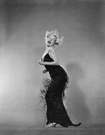 1959-10-NY-Jump_sitting-black_dress-by_halsman-011-1