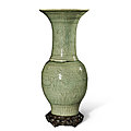 A carved 'longquan' celadon-glazed 'peony' vase, late ming dynasty