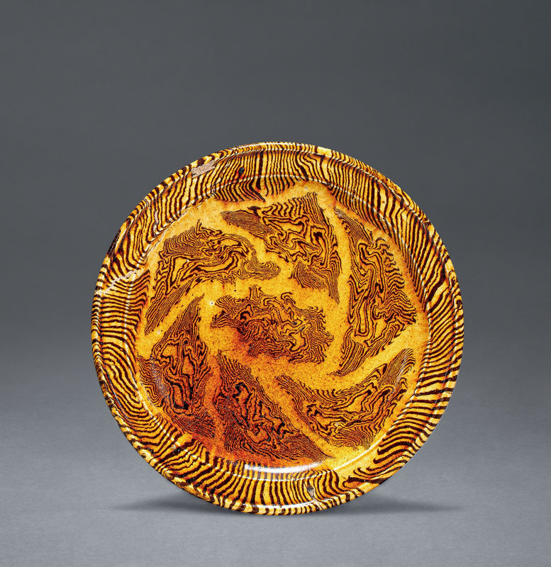 A yellow-glazed marble dish, Tang dynasty (618-907)