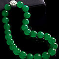 An impressive jadeite bead and diamond necklace