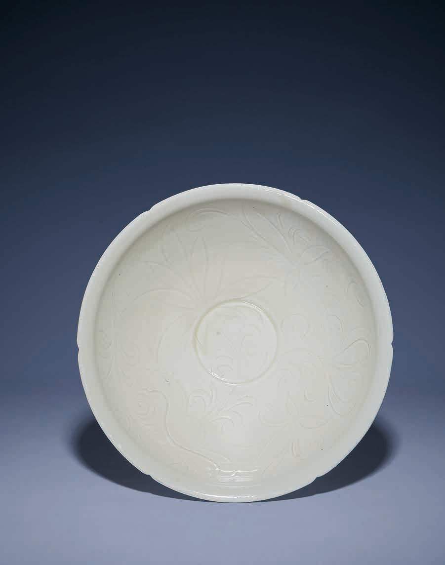 A rare moulded Ding dish, Yuan dynasty(1279-1368)