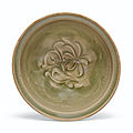 A carved yaozhou celadon bowl, northern song-jin dynasty (ad 960-1234)