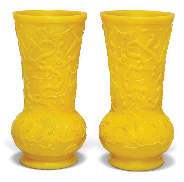 A pair of yellow glass vases, 20th century