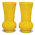 A pair of yellow glass vases, 20th century