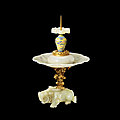 A rare documented imperial gilt bronze-decorated white jade candlestick, seal mark and period of qianlong