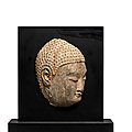 A limestone fragment of a buddha head, northern qi dynasty (550–577)