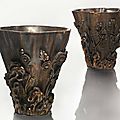 A pair of carved chenxiangmu cups, 17th century