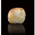 A white and russet jade carving of a goat, qianlong (1736-1795)