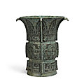 An inscribed archaic bronze ritual wine vessel (zun), late shang dynasty