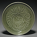 A carved yaozhou 'lotus' dish, northern song-jin dynasty, 12th-13th century