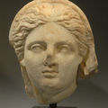 Important greek marble veiled head of a goddess. 4th century bc