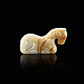 A white and russet jade recumbent horse, six dynasties (265-589)
