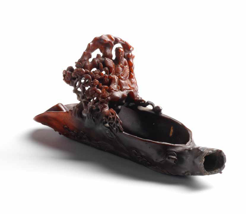 A very rare rhinoceros horn 'Zhang Qian in a raft' pouring vessel, 17th-18th century