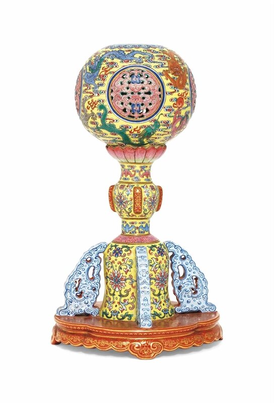 An imperial and very rare yellow-ground famille rose 'nine dragons' hat stand, Daoguang six-character seal mark in gilt and of the period (1821-1850)