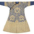 A kesi silk gold and blue-ground 'nine-dragon' robe, 19th century