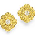 A pair of diamond and yellow sapphire ear clips, by van cleef & arpels