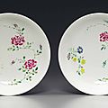 A pair of famille rose 'boneless' saucer dishes, Yongzheng six-character marks in underglazze blue within double circiles and of the period (1723-1735)