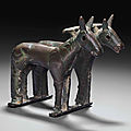 A rare bronze 'double horse' yoke ornament, northwest china, inner mongolia, 5th-4th century bc