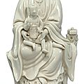 A 'dehua' figure of guanyin and child, 17th-18th century