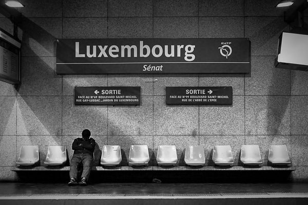 sleeping-in-metro-paris-street-photo
