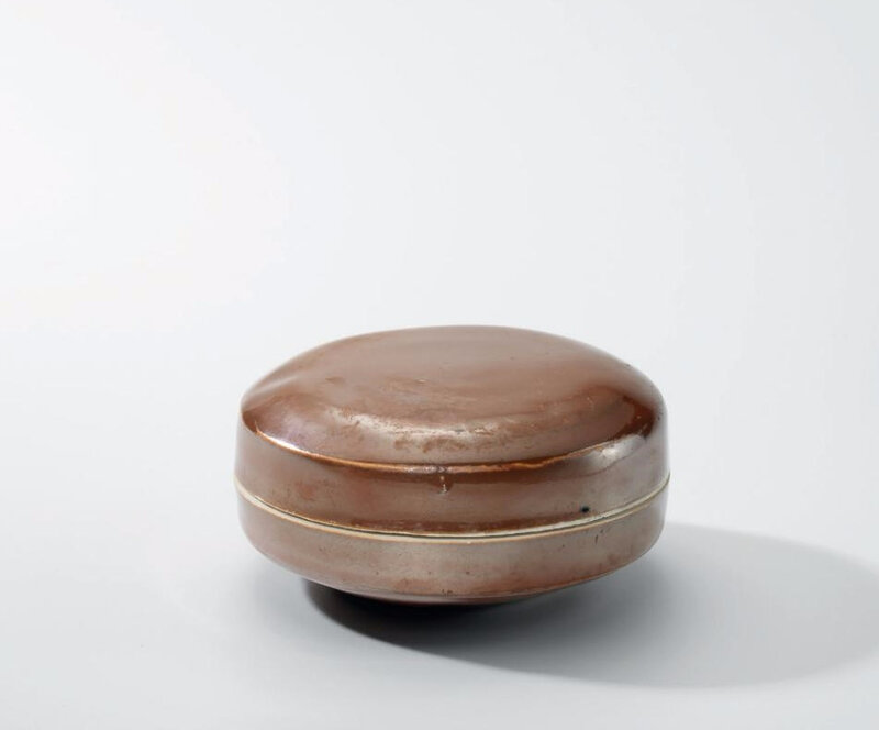 A Ding persimmon-glazed circular box and cover, Northern Song-Jin dynasty (960-1234)