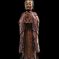 A fine and large gilt, red and black-lacquered wood figure of guanyin, late ming-early qing dynasty