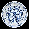 A chinese blue and white moulded dish, kangxi mark and period (1662-1722)