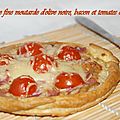 Tarte fine à la moutarde d'olives noires , bacon et tomates cerises