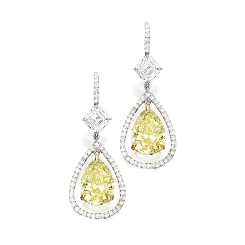 Pair of platinum, 18 karat gold, fancy yellow diamond and diamond ...