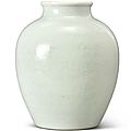 A white-glazed incised vase, qing dynasty, 18th century.