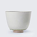 A white-glazed deep cup, sui dynasty (581-618)