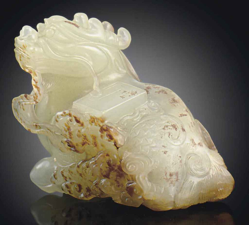 2011_NYR_02427_1484_000(a_small_white_and_russet_jade_carving_of_a_qilin_ming_dynasty_17th_cen)