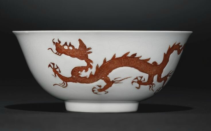 An extremely rare iron-red enamelled 'Dragon' bowl, Hongzhi mark and period