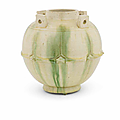 A green-glazed 'lotus-petal' jar, guan, Tang Dynasty (618-907)