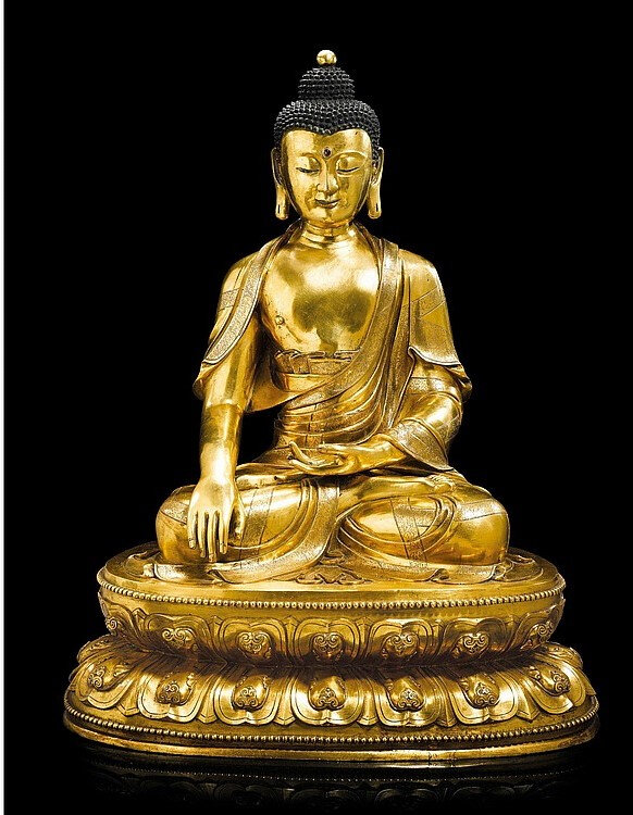 A magnificent and exceptionally large gilt-bronze figure of Shakyamuni ...