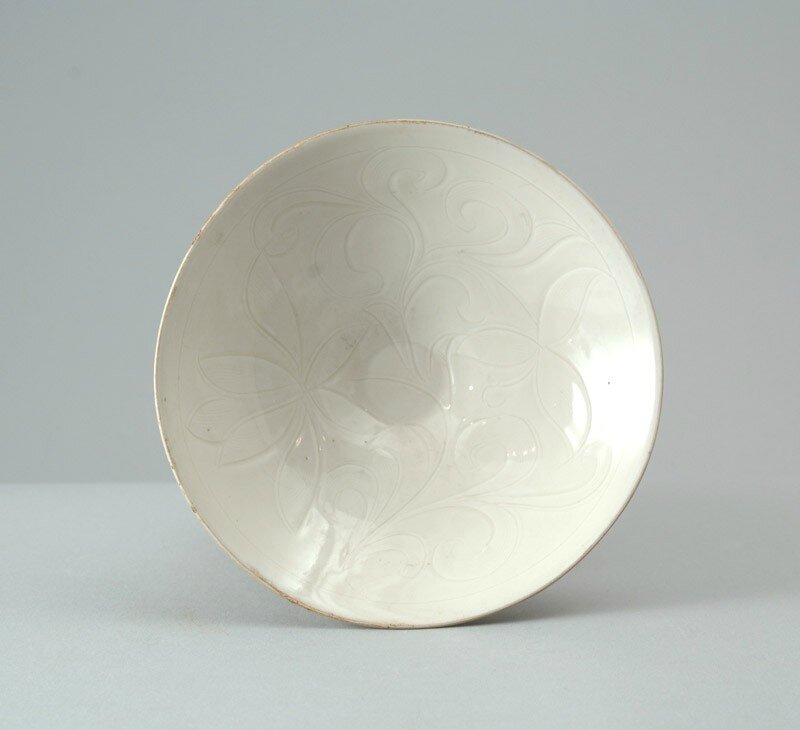 White ware dish with floral decoration, Ding kilns, 2nd half of the 11th century - 1st half of the 12th century