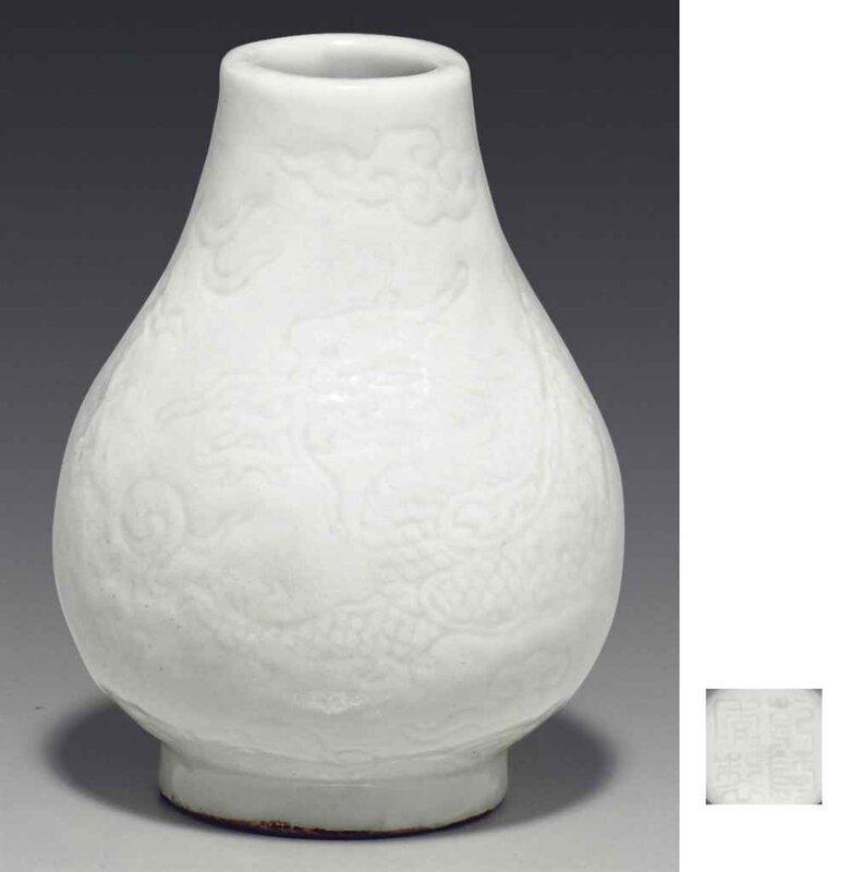 2011_NYR_02427_1760_000(an_unusual_miniature_white-glazed_hu-form_vase_qianlong_four-character)