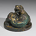 A gilt-bronze chilong-form weight, han dynasty (206 bc-220 ad)
