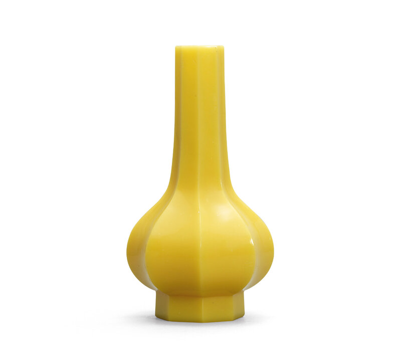 A yellow glass fluted vase, Qianlong incised four-character mark within a square and of the period (1736-1795)