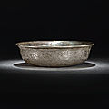 A superb and rare silvered-metal 'mandarin ducks' bowl, tang dynasty (618-907)