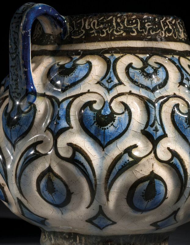 2020_CKS_18371_0004_006(a_kashan_moulded_cobalt-blue_black_and_white_jug_central_iran_early_13_d6255679)